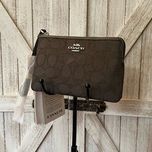 Coach grayish brown Signature Wristlet